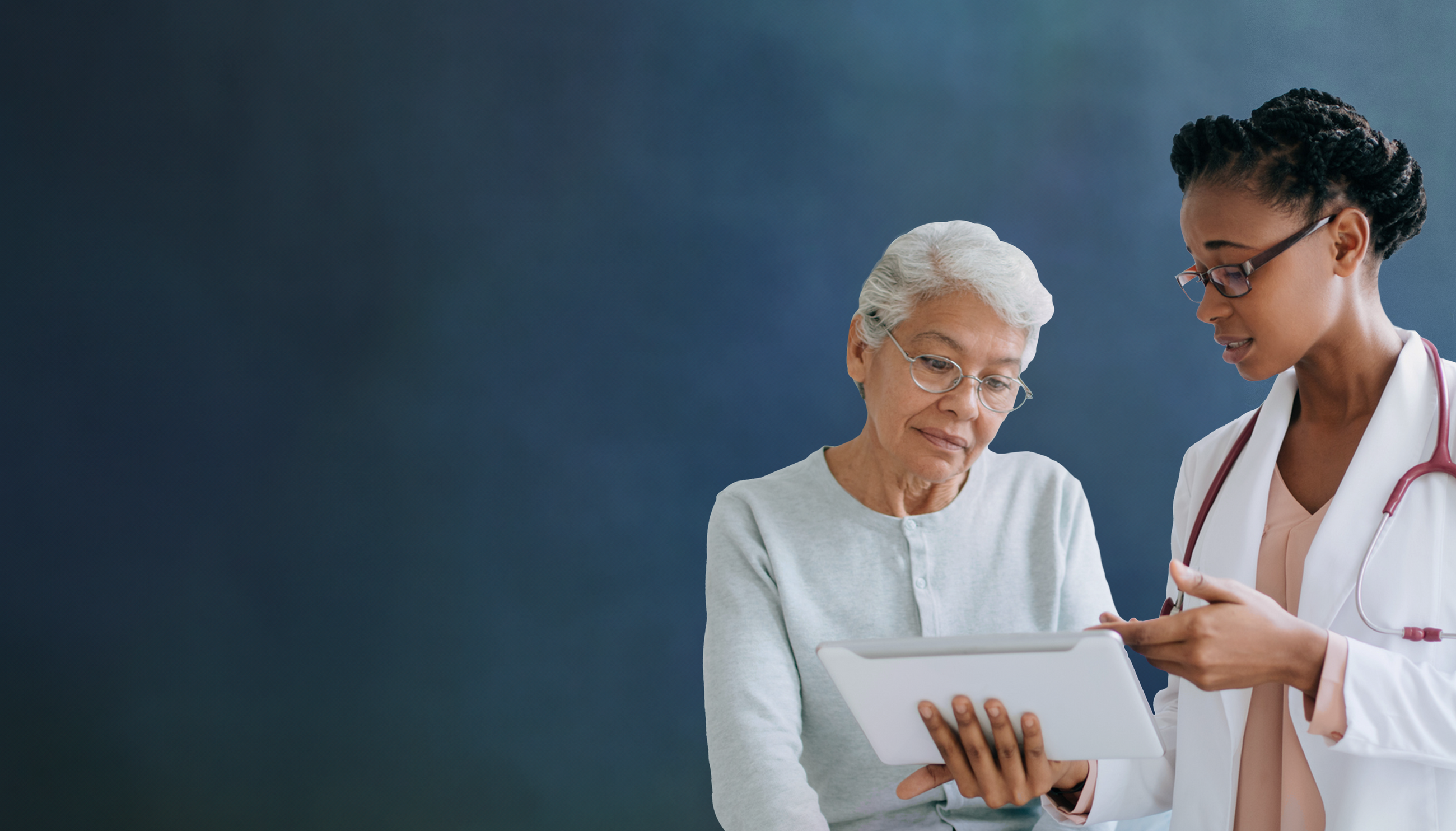 doctor consulting elderly patient with tablet medical consultation healthcare